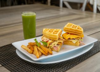 Best Breakfast Spots in North Bergen for 2026: A Local’s Guide Savor a waffle sandwich with fries and a refreshing green juice, perfect for dining outdoors.