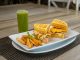 Best Breakfast Spots in North Bergen for 2026: A Local’s Guide Savor a waffle sandwich with fries and a refreshing green juice, perfect for dining outdoors.