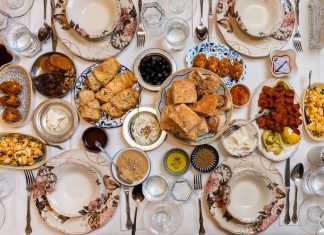Best Brunch in Newark: Top Spots for 2026 A top-down view of a traditional Turkish feast with assorted dishes and elegant tableware.