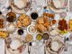 A top-down view of a traditional Turkish feast with assorted dishes and elegant tableware.