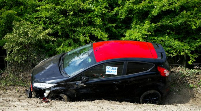 BREAKING: Fatal Crash Shuts Down Route 3 in Hudson County A black and red car, marked by police, abandoned off a road in Welwyn Garden City, UK.