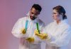 Ebola outbreak in Africa: What Hudson County needs to know Two scientists in protective gear analyze chemical samples in a laboratory setting.