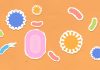 Vibrant illustration of soap and viruses on an orange background, emphasizing hygiene.