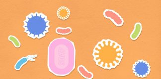 Vibrant illustration of soap and viruses on an orange background, emphasizing hygiene.