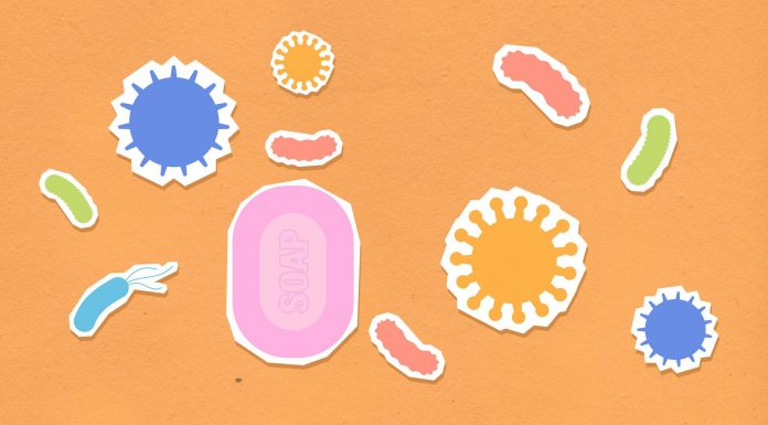 Vibrant illustration of soap and viruses on an orange background, emphasizing hygiene.