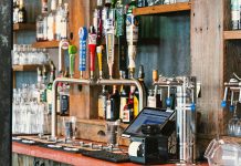 A charming bar setting with an array of craft beer taps and liquor bottles in San Francisco.