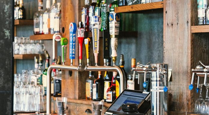 A charming bar setting with an array of craft beer taps and liquor bottles in San Francisco.