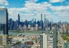 Things Locals Love About Living in West New York (2026 Guide) Explore the stunning New York City skyline with a clear view of iconic skyscrapers under a vibrant sky.