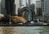 16 NJ Towns for a Day Trip: Your Hudson County Guide Elegant cityscape featuring modern waterfront buildings and a marina in an urban setting.
