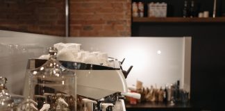 Best Coffee Shops in Elizabeth NJ: A Local’s Guide to the City’s Top Brews in 2026 A cozy coffee shop interior featuring a modern espresso machine and various coffee accessories.