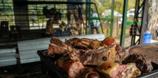 Best Colombian Food in Jersey City: Top Spots, Dishes & Local Favorites (2026 Guide) A close-up of a fresh, rustic barbecue platter filled with various grilled meats, perfect for outdoor gatherings.