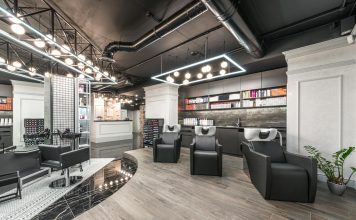 Best Salons and Barbershops in North Bergen, NJ (2026 Guide) Comfortable backwash chairs with sinks near potted plant placed in contemporary beauty salon with bright illumination and abundance of cosmetology products