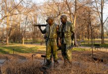 Bronze sculpture of three soldiers at the Vietnam Veterans Memorial in Washington, D.C.