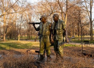Bronze sculpture of three soldiers at the Vietnam Veterans Memorial in Washington, D.C.