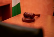 BREAKING: Man Guilty in 2024 Murder of Hoboken’s Damon Murray A close-up of a gavel on a courtroom desk representing law and justice.
