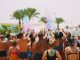 BREAKING: Vibrant weekend events set for Jersey City on June 6-7 A lively outdoor Holi celebration on the beach with colorful powder and a joyful crowd.