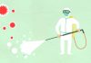 Decorative paper appliques of cleaning person in protective equipment spraying disinfectant during COVID 19 pandemic on green background