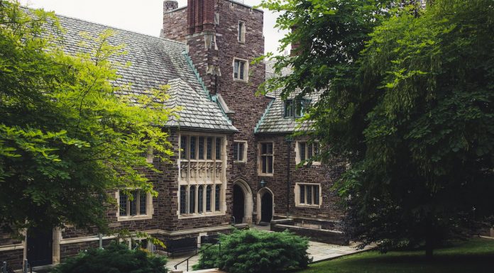 Colleges Near Jersey City NJ: Your Complete Guide to Higher Education (2026) Elegant Gothic architecture of Princeton University surrounded by lush greenery on a summer day.