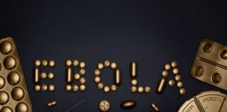 Creative arrangement of pills spelling 'EBOLA', showcasing a conceptual healthcare theme.