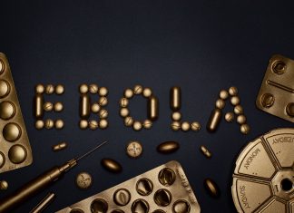 Ebola Outbreak in Uganda: What Hudson County Needs to Know Creative arrangement of pills spelling 'EBOLA', showcasing a conceptual healthcare theme.