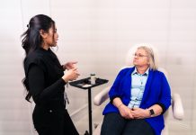 Evolve Med Spa Brings Back Skin + Body Event on June 25 Female professional consulting with senior client in a Santa Ana med spa.