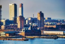 Free Things To Do in Elizabeth, New Jersey (2026 Guide) A stunning view of New York City's skyline and waterfront captured in daylight.