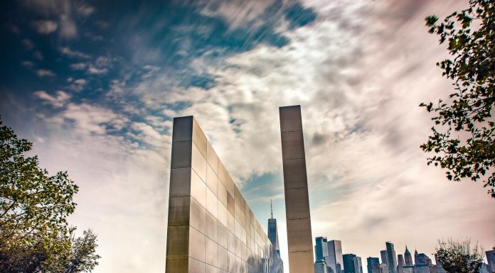 Free Things To Do in Union City, NJ (2026 Guide) Stunning reflection memorial with New York City skyline in the background under a dynamic sky.
