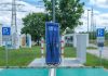 Public charging station with eco-friendly design for electric vehicles.