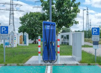 Public charging station with eco-friendly design for electric vehicles.