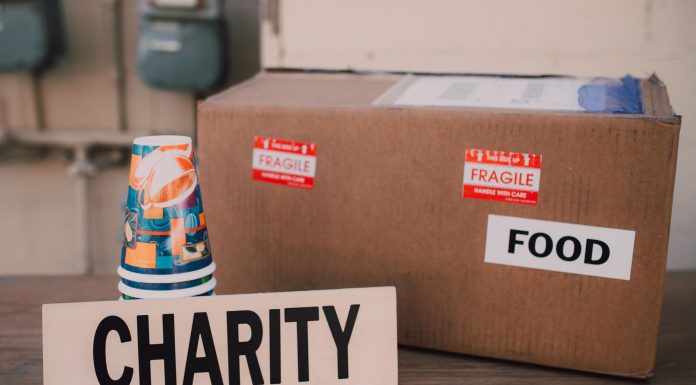 RWJBarnabas Gives $1.3M to Jersey City Nonprofits for Health and Food Aid Image of a charity donation box filled with food supplies and paper cups.