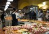 Salumeria Ercolano Moves Into Historic Miss America Diner Space Shoppers wearing masks buy pizza slices from a bakery in Bergamo, Italy.