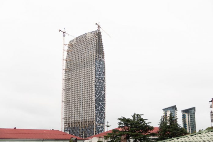 High-rise under construction in Batumi, Georgia, showcasing urban development.