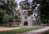 Explore the iconic gothic architecture of Princeton University, surrounded by lush greenery.