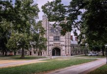 Explore the iconic gothic architecture of Princeton University, surrounded by lush greenery.