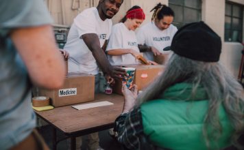 A Year of Giving: Jersey City Nonprofit Celebrates Anniversary on MLK Drive Volunteers handing out donations and support to those in need at a community event.