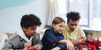 Top After School Programs in Elizabeth, NJ for 2026: A Local Parent’s Guide Diverse kids collaborating on robotics project, promoting STEM learning in a creative environment.