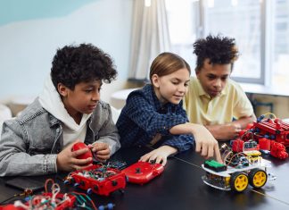Top After School Programs in Elizabeth, NJ for 2026: A Local Parent’s Guide Diverse kids collaborating on robotics project, promoting STEM learning in a creative environment.