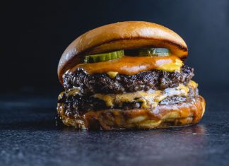 Best Burgers in Elizabeth: A Local’s Guide to the Juiciest, Messiest, and Most Creative Patties in 2026 Mouth-watering beef cheeseburger with pickles, perfect for gourmet food photography.