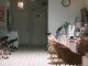 A cozy and modern nail salon interior featuring stylish chairs and nail polish display.