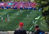 Engaging view of soccer fans enjoying a live match at a stadium in Langford, BC, Canada.