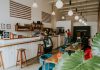 BREAKING: Gemini Cafe Opens in Jersey City’s Van Vorst Park Area Inviting coffee shop with modern design, customers enjoying drinks, and stylish decor.