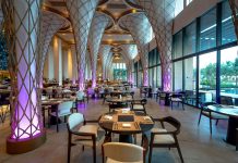 BREAKING: Haven House Restaurant Opens in Bayonne Spacious modern restaurant interior with unique architectural design and ambient lighting.