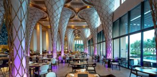 BREAKING: Haven House Restaurant Opens in Bayonne Spacious modern restaurant interior with unique architectural design and ambient lighting.