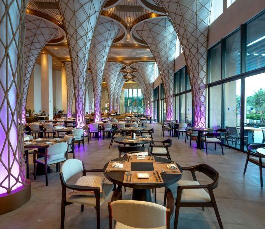BREAKING: Haven House Restaurant Opens in Bayonne Spacious modern restaurant interior with unique architectural design and ambient lighting.