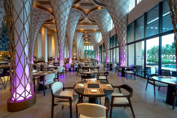 breaking-haven-house-restaurant-opens-in-bayonne Spacious modern restaurant interior with unique architectural design and ambient lighting.