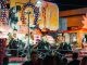 BREAKING: Jersey City Italian Festival Returns for 124th Year in August People enjoying a vibrant bull ride at an outdoor funfair at night.