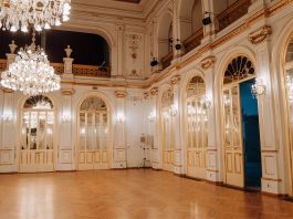 BREAKING: White Eagle Hall to Change Management, Stay Open Elegant concert hall with chandeliers and ornate decor in Maribor, Slovenia.
