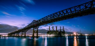 Stunning evening photograph of the Pulaski Skyway over water in New Jersey.