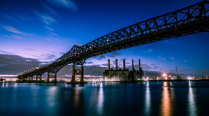 Stunning evening photograph of the Pulaski Skyway over water in New Jersey.