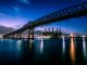 Stunning evening photograph of the Pulaski Skyway over water in New Jersey.